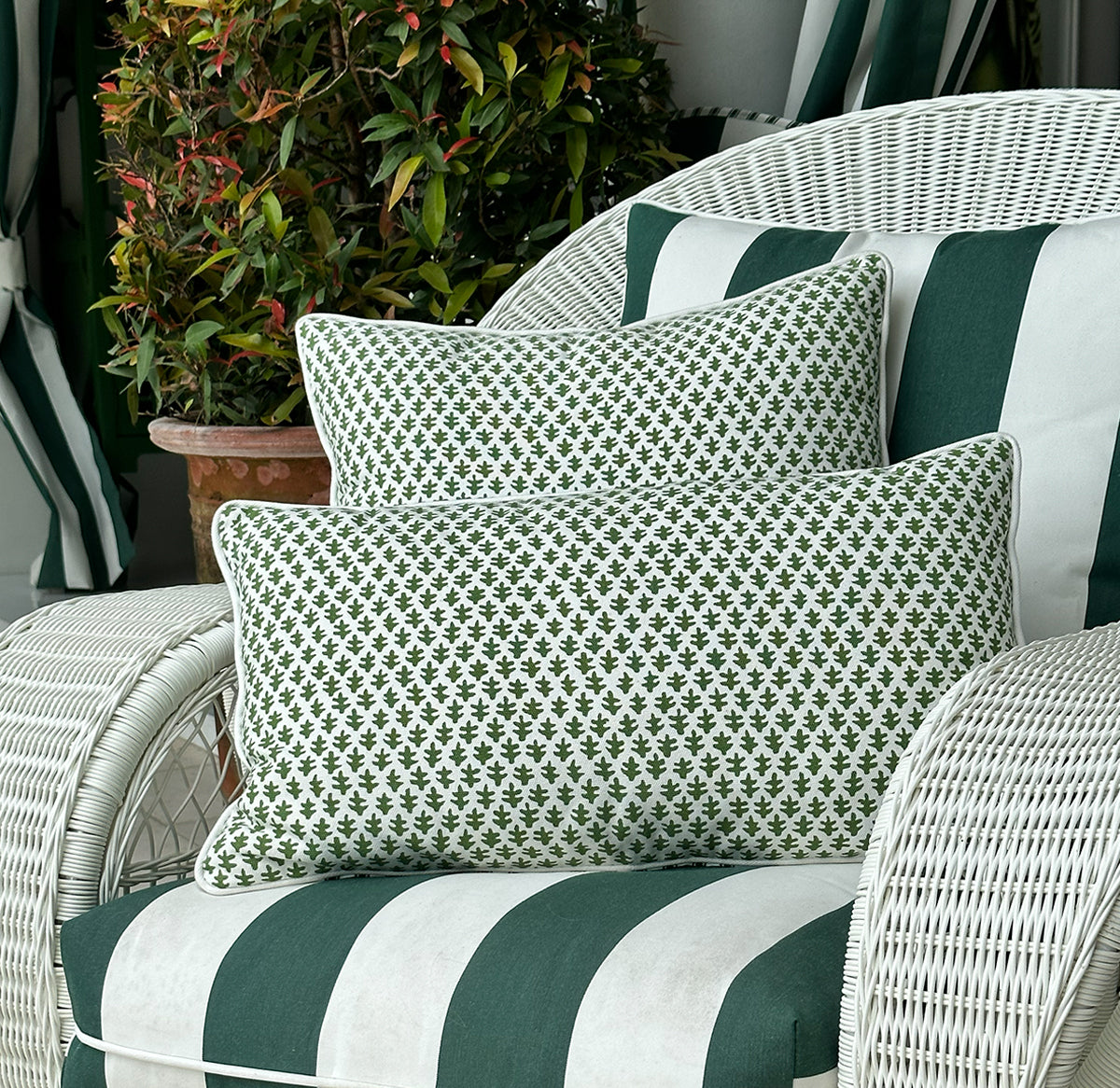 Refresh your home with the Chicken Cushion in premium cotton canvas. Features a parrot green foulard design with white piping. Discover more!