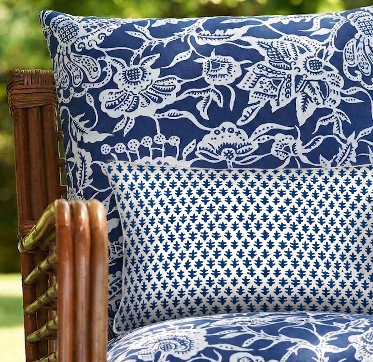 Elevate your decor with the Chicken Lumbar Cushion in lightweight cotton canvas. Features a storm blue foulard design with white piping. Shop the look!