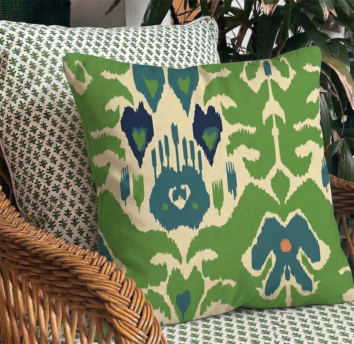 Discover the heritage artistry of the Nakara Ikat Cushion. Features a vivid reimagined ikat design on soft cotton, reversing to navy ticking. Shop now!