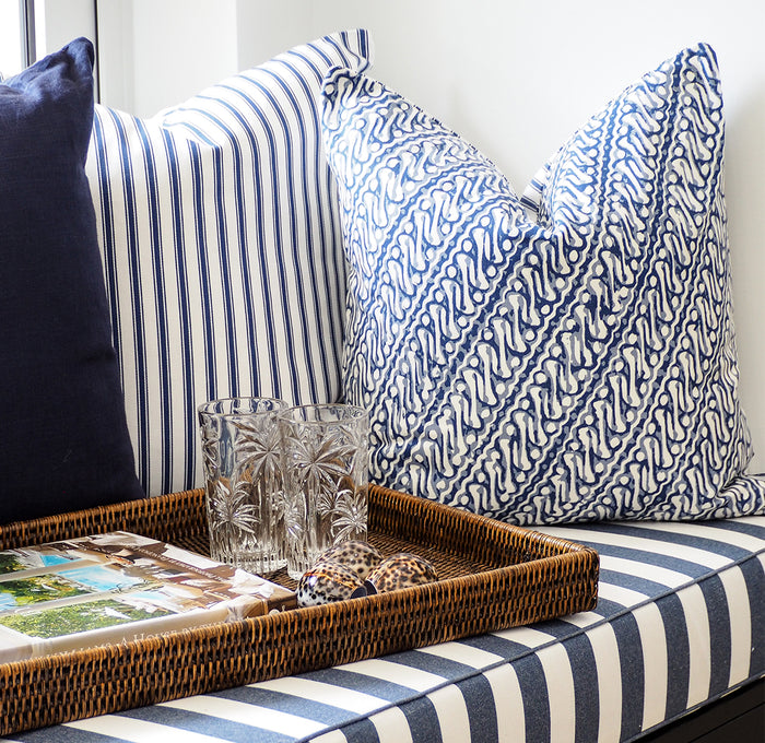 Discover the artisanal beauty of the Jawa Cushion. Inspired by Indonesian heritage textiles in storm blue cotton canvas. Explore the collection now!