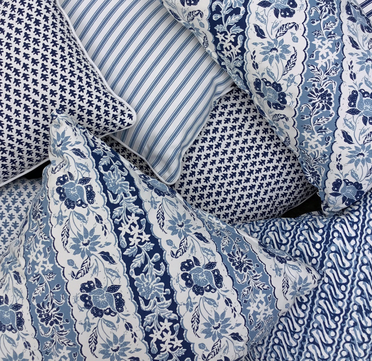 Elevate your home with the exotic Sumatra Cushion. Features a blue and white diagonal Batik reversing to classic ticking. Explore the range today!