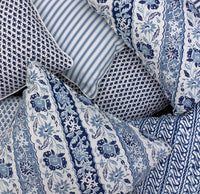Elevate your home with the exotic Sumatra Cushion. Features a blue and white diagonal Batik reversing to classic ticking. Explore the range today!