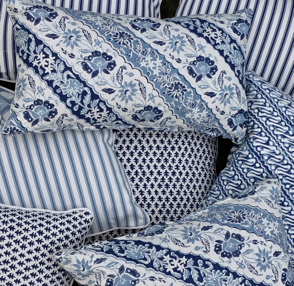 Add a relaxed coastal touch with the Sumatra Lumbar Cushion. Features an exotic diagonal Batik reversing to navy and white ticking. Shop the collection!