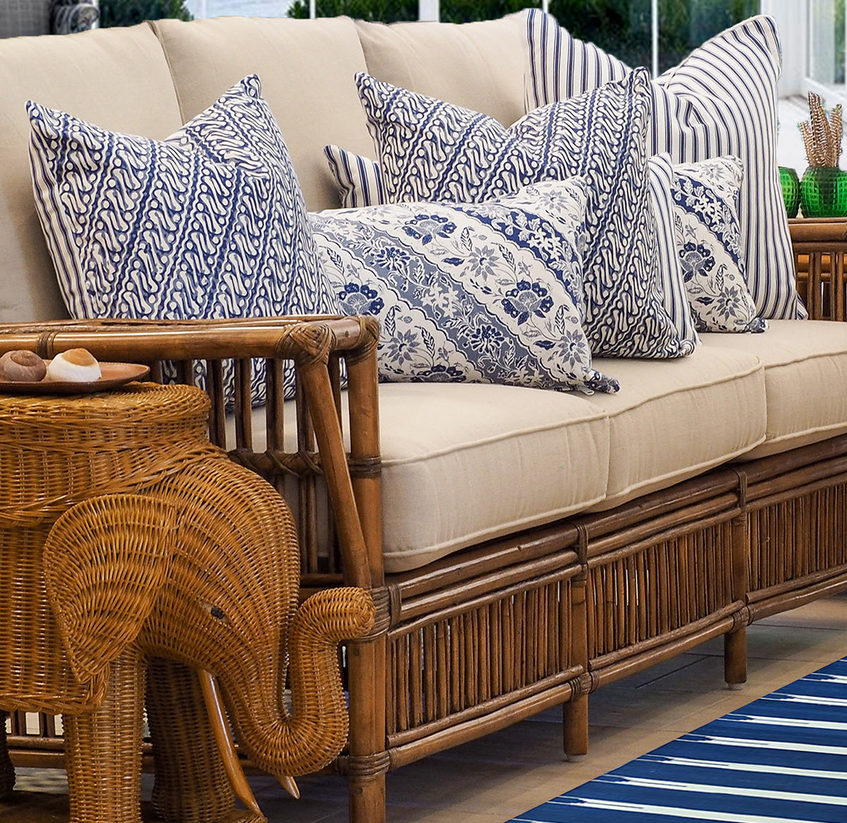 Add a relaxed coastal touch with the Sumatra Lumbar Cushion. Features an exotic diagonal Batik reversing to navy and white ticking. Shop the collection!