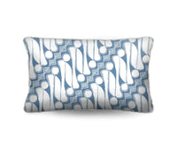Elevate your sofa or bed with the island-inspired Sulawesi Lumbar Cushion. Features a white Batik on cadet blue cotton canvas. Upgrade today!